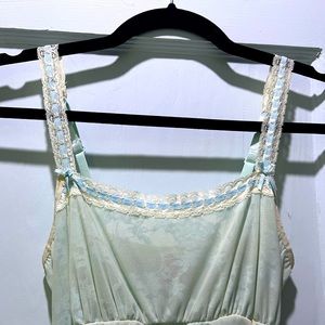 Lacy pale blue and nude slip